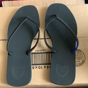 Rothy’s black flip flops